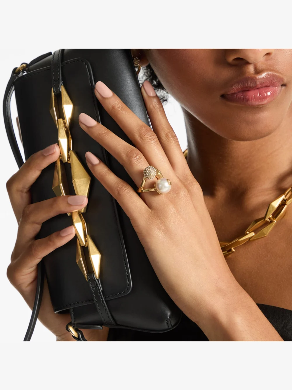 Side view of the Jimmy Choo Multi Charm Ring Gold Finish Pearl Ring