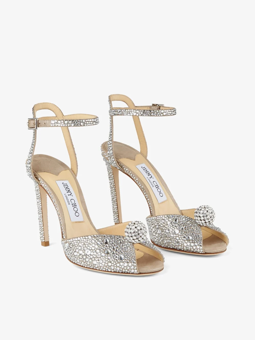 Side view of the Jimmy Choo Sacora 100 Nude Suede Sandals with Hotfix Crystals and Sphere Detail