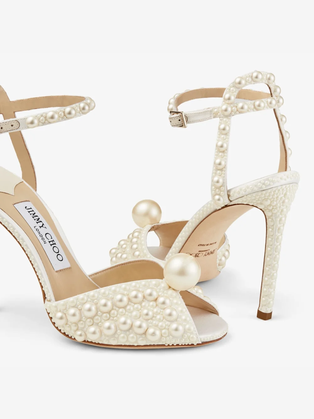 Close-up detail of the Jimmy Choo Sacora 100 White Satin Sandals with All Over Pearls