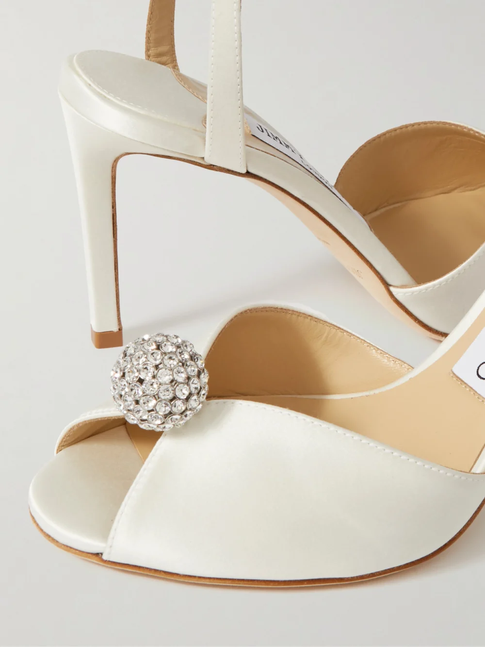 Close-up detail of the Jimmy Choo Sacora 85 Crystal-embellished Satin Sandals