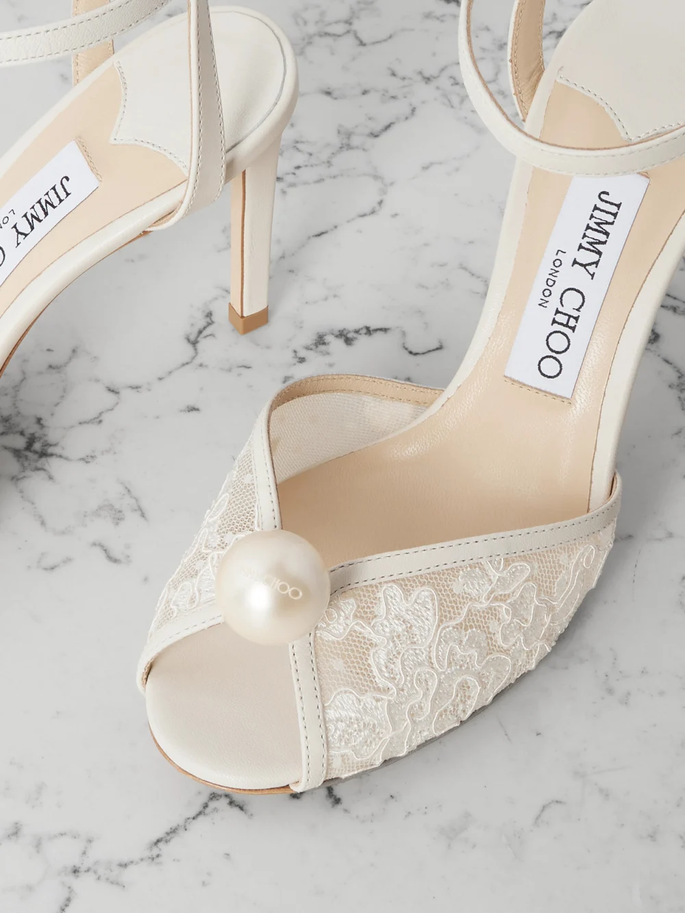 Close-up detail of the Jimmy Choo Sacora 85 Embellished Leather-trimmed Lace Sandals