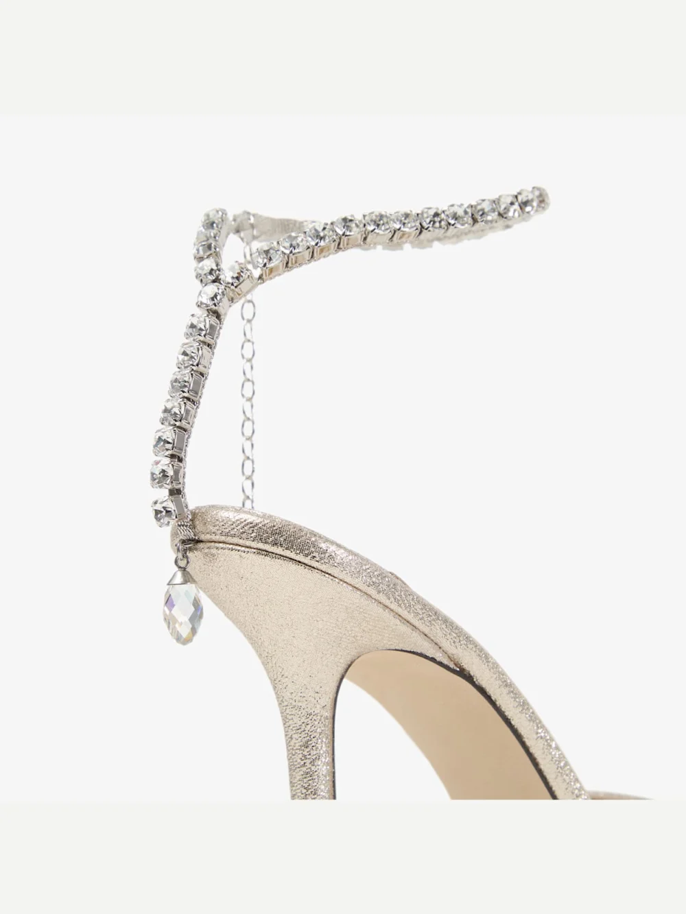 Back view of the Jimmy Choo Saeda 100 Platinum Brilliance Fabric Pumps with Crystal Chain