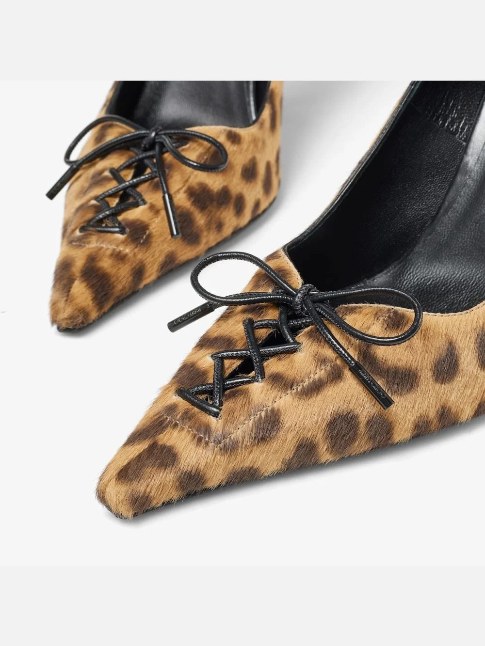 Close-up detail of the Jimmy Choo Scarlett 95 Natural Leopard Print Pony Pumps