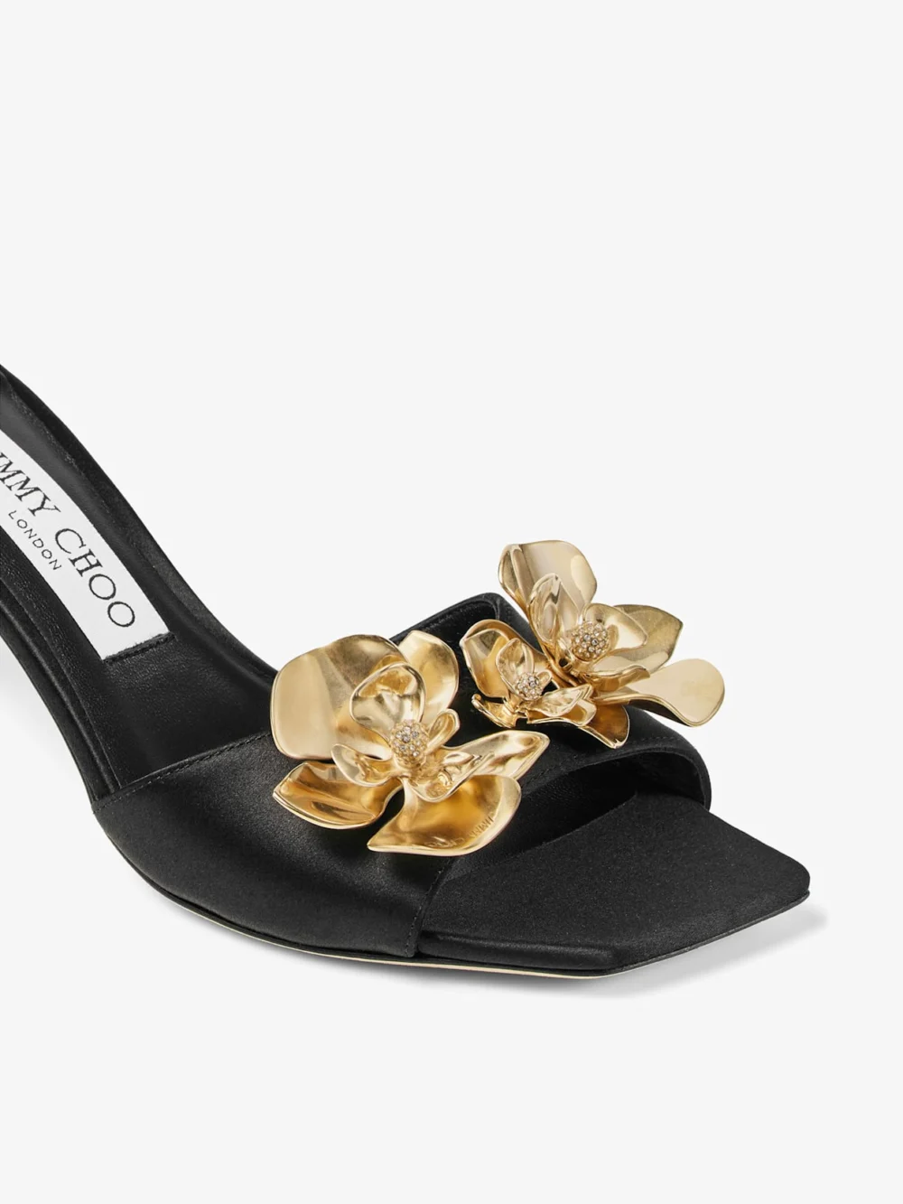 Back view of the Jimmy Choo Skye 70 Zea Flower Black Satin Mule Sandals with Flower Jewels