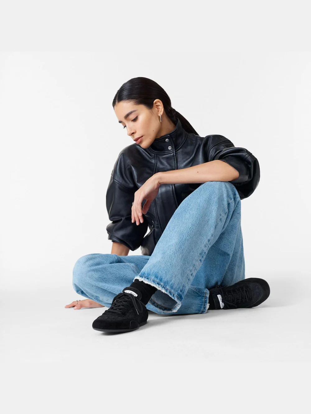 Side view of the Jimmy Choo Sunny F Black Leather Mix and Jimmy Choo Lace Low Top Trainers