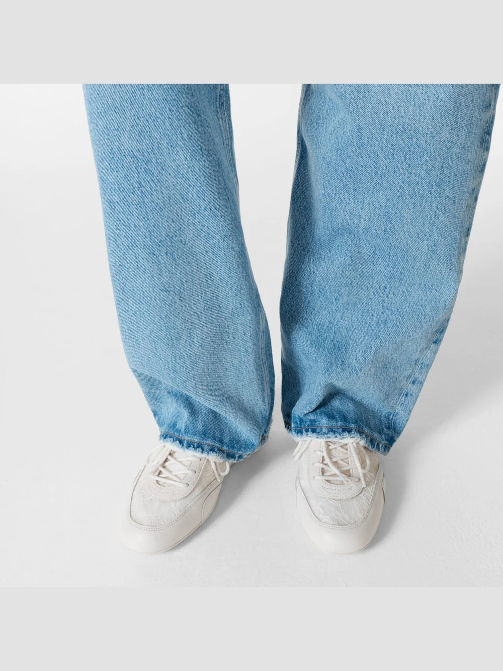 Close-up detail of the Jimmy Choo Sunny F Latte Leather Mix and Jimmy Choo Lace Low Top Trainers