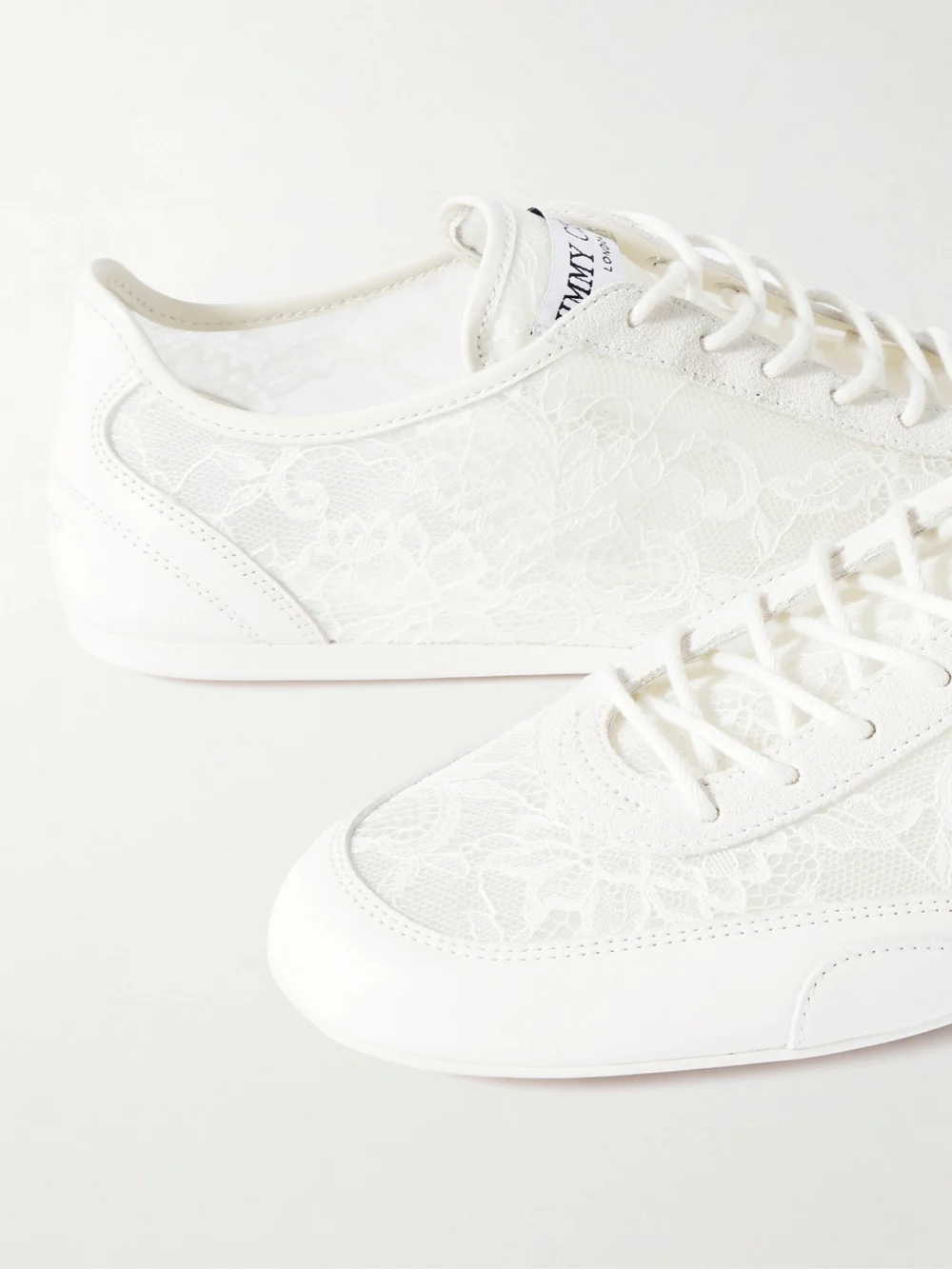 Close-up detail of the Jimmy Choo Sunny Suede-trimmed Leather and Lace Sneakers