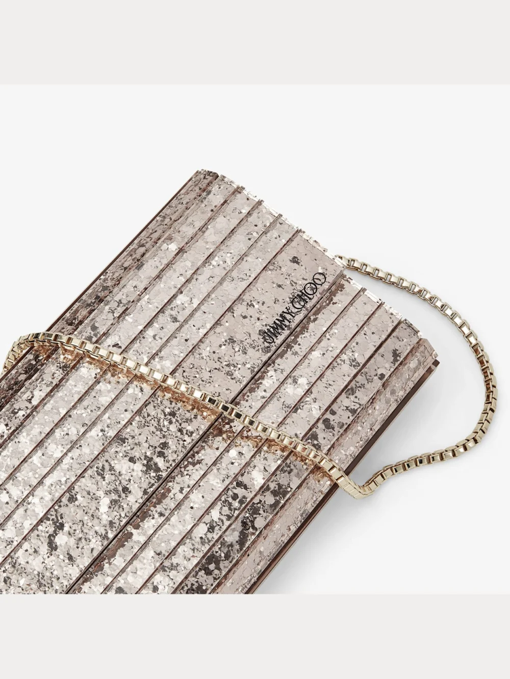 Close-up detail of the Jimmy Choo Sweetie Ballet Pink Shadow Coarse Glitter Acrylic Clutch Bag
