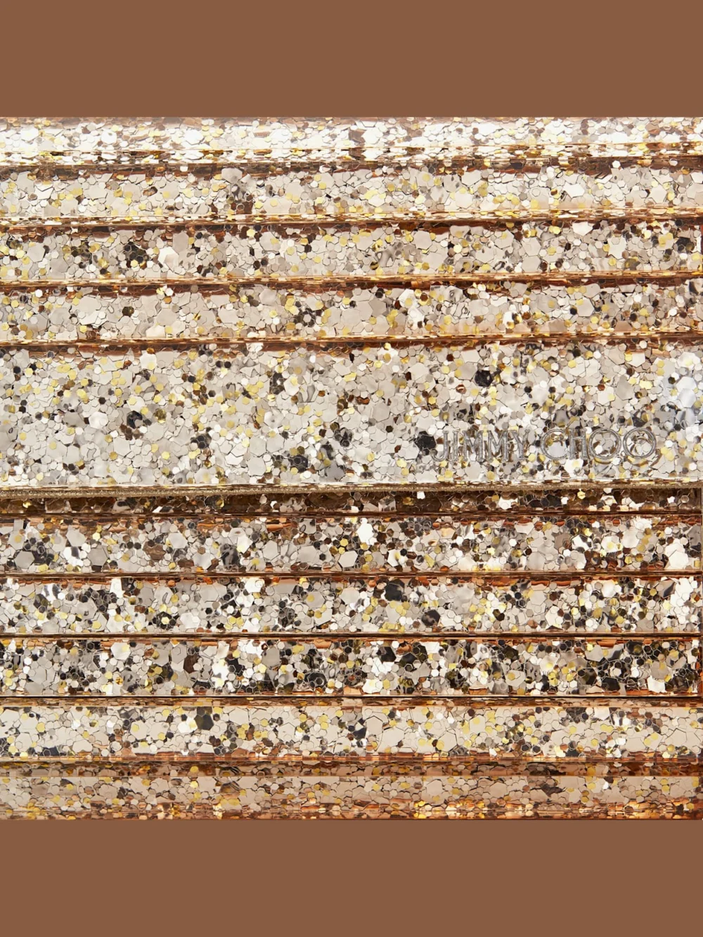 Close-up detail of the Jimmy Choo Sweetie Metallic Dégradé Glitter Plexi Clutch Bag