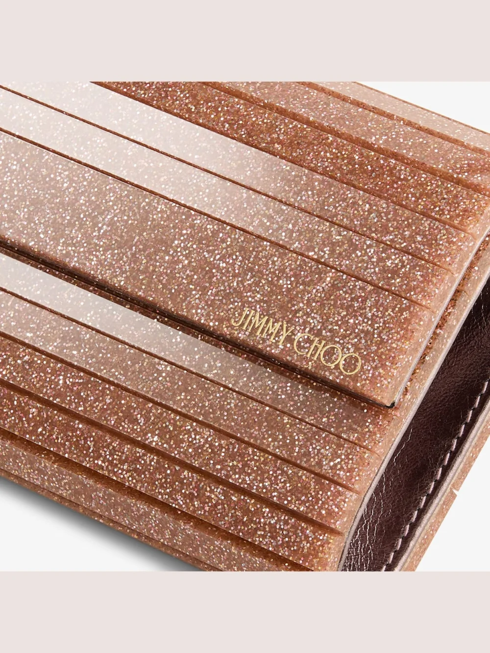 Close-up detail of the Jimmy Choo Sweetie Rose Fine Glitter Acrylic Clutch Bag