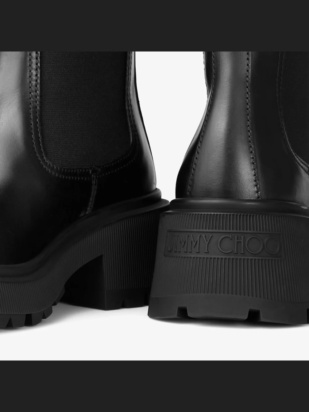 Back view of the Jimmy Choo Tamia Chelsea Flat Black Shiny Calf Leather Chelsea Boots