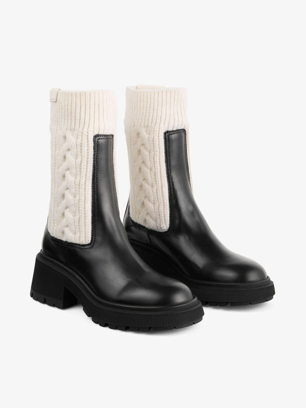 Close-up detail of the Jimmy Choo Tamia Flat Black and Latte Shiny Calf Leather and Cable Knit Wool Chelsea Boots