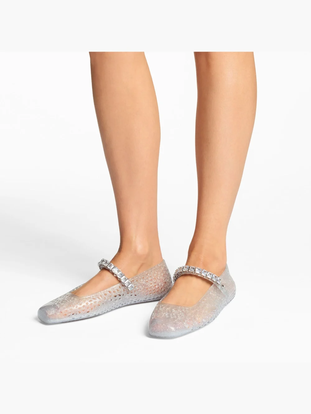 Side view of the Jimmy Choo The Jelly Clear Jelly Ballerina Flats with Crystal Embellishment
