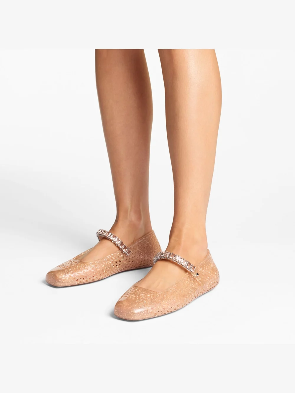 Side view of the Jimmy Choo The Jelly Light Toffee Jelly Ballerina Flats with Crystal Embellishment