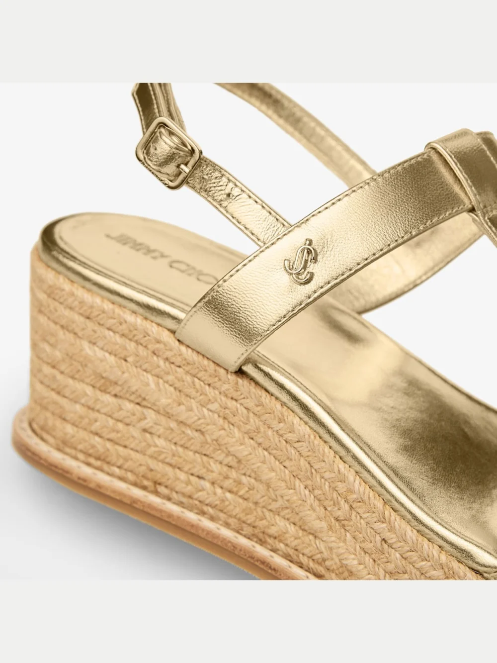 Back view of the Jimmy Choo Theia Wedge 60 Gold Metallic Leather Wedge Sandals