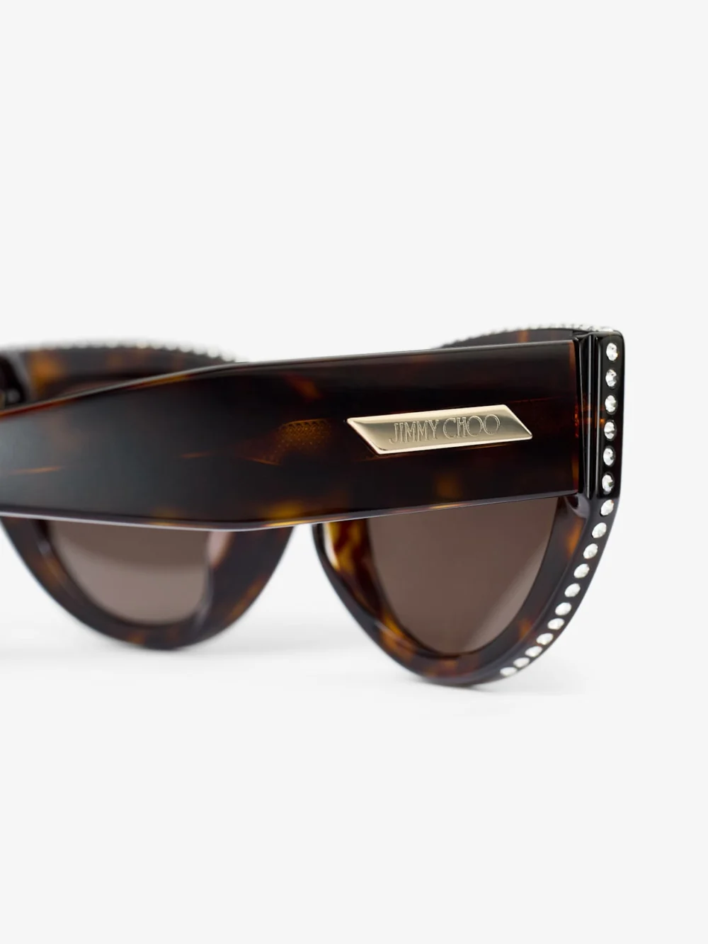 Close-up detail of the Jimmy Choo Vale Brown Havana Cat Eye Sunglasses