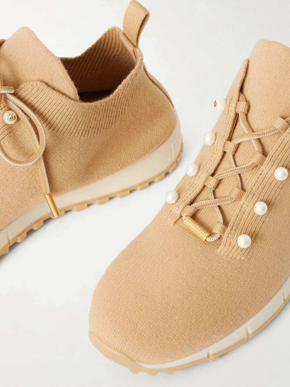 Close-up detail of the Jimmy Choo Veles Embellished Knitted Sneakers