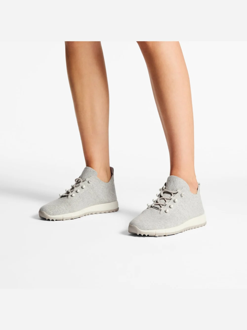 Side view of the Jimmy Choo Veles Moon Mix Cashmere Melange Knit Trainers with Pearl Buttons
