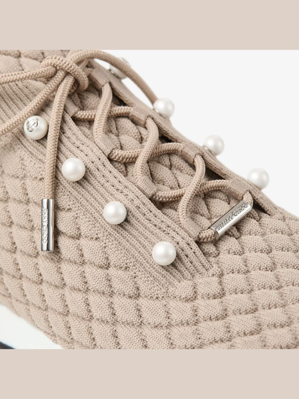 Back view of the Jimmy Choo Veles Stone Textured Knit Trainers