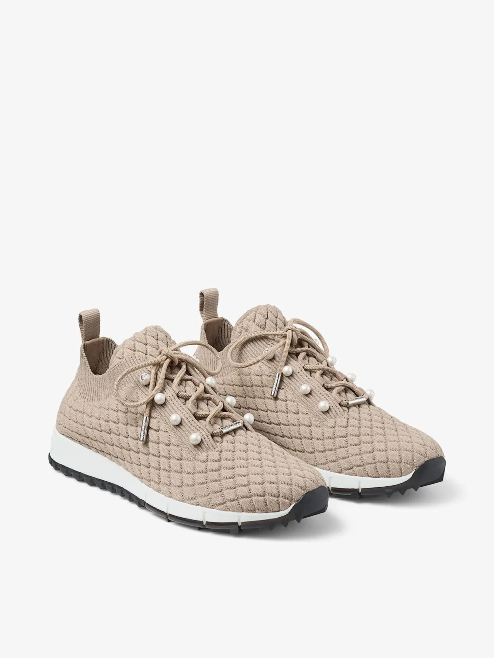 Close-up detail of the Jimmy Choo Veles Stone Textured Knit Trainers