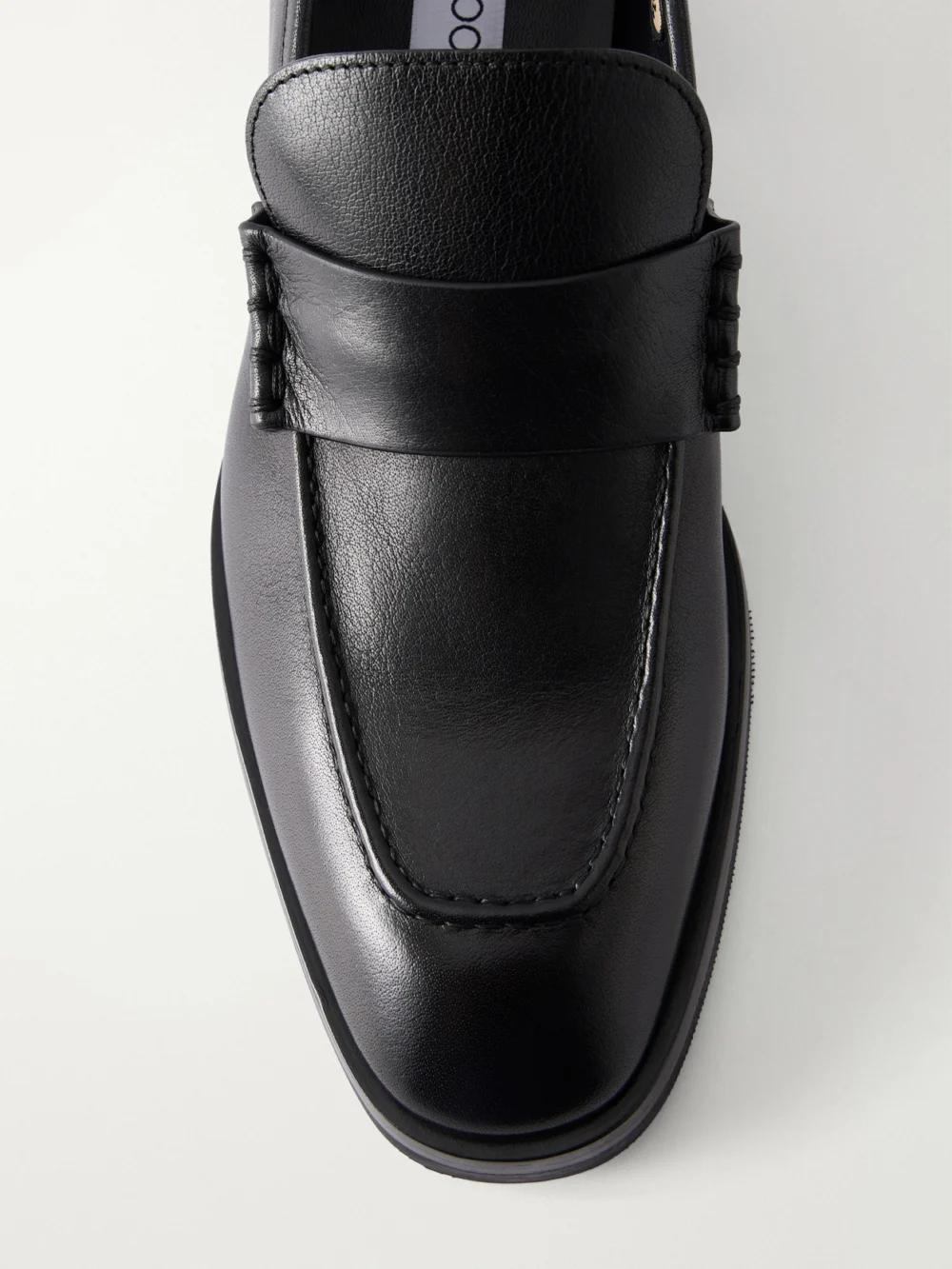 Close-up detail of the Jimmy Choo Wilder Leather Loafers