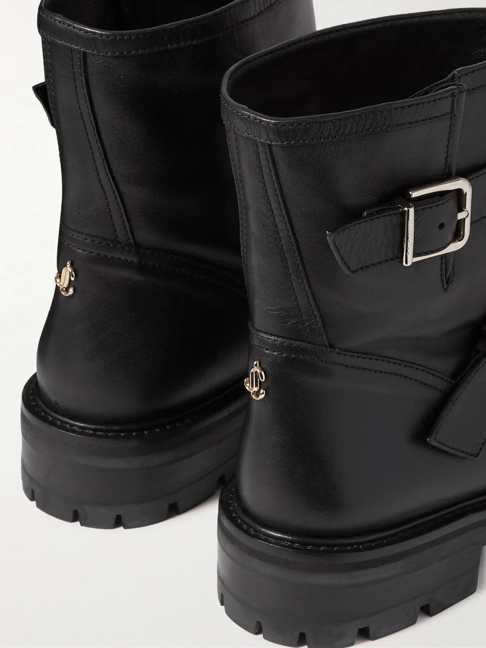 Close-up detail of the Jimmy Choo Youth Ii Buckled Leather Ankle Boots