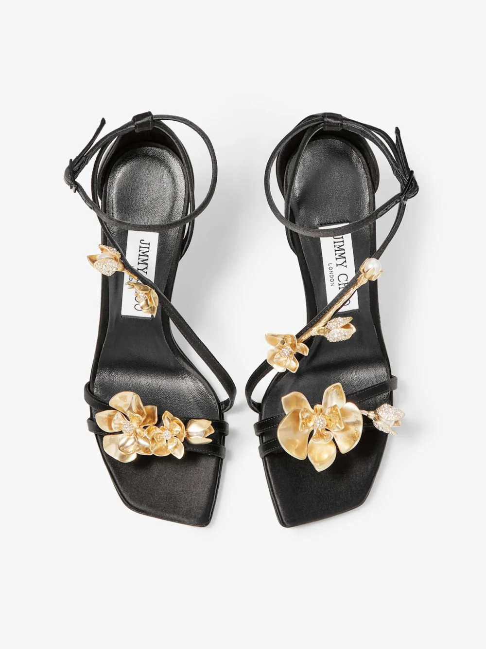 Back view of the Jimmy Choo Zea 95 Black Satin Sandals with Metal Flowers