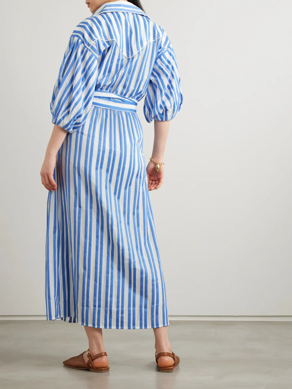 Back view of the Johanna Ortiz Buena Mar Belted Striped Cotton-voile Midi Dress