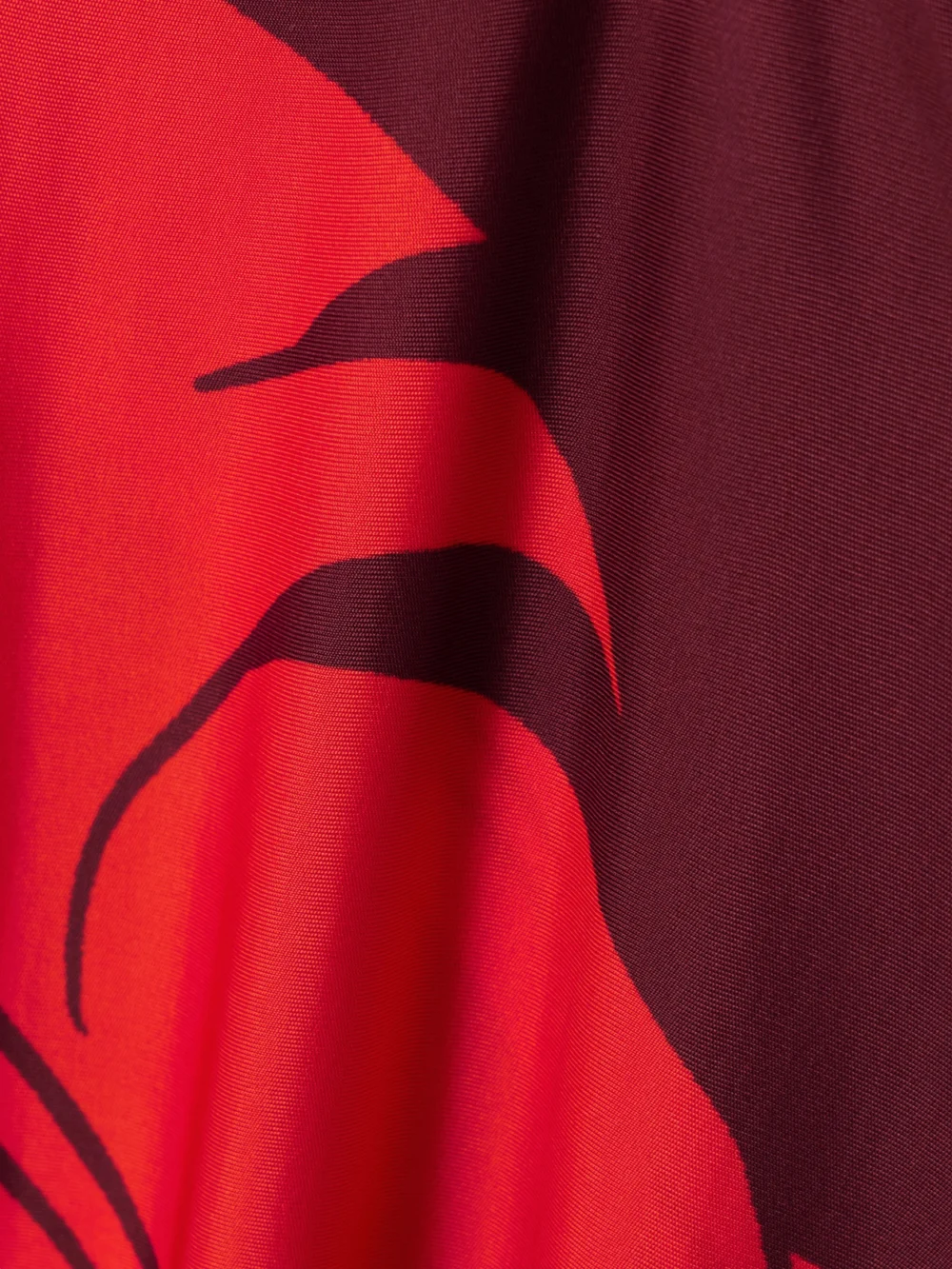 Close-up detail of the Johanna Ortiz Deep Heart Twist-front Cutout Printed Stretch-jersey Midi Dress