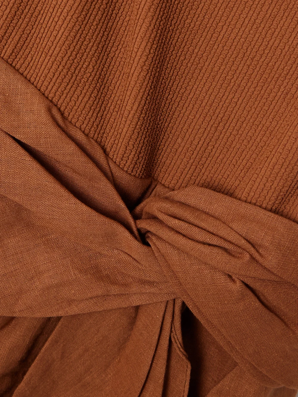 Close-up detail of the Johanna Ortiz Encanto Pacifico Asymmetric Linen and Ribbed-knit Dress