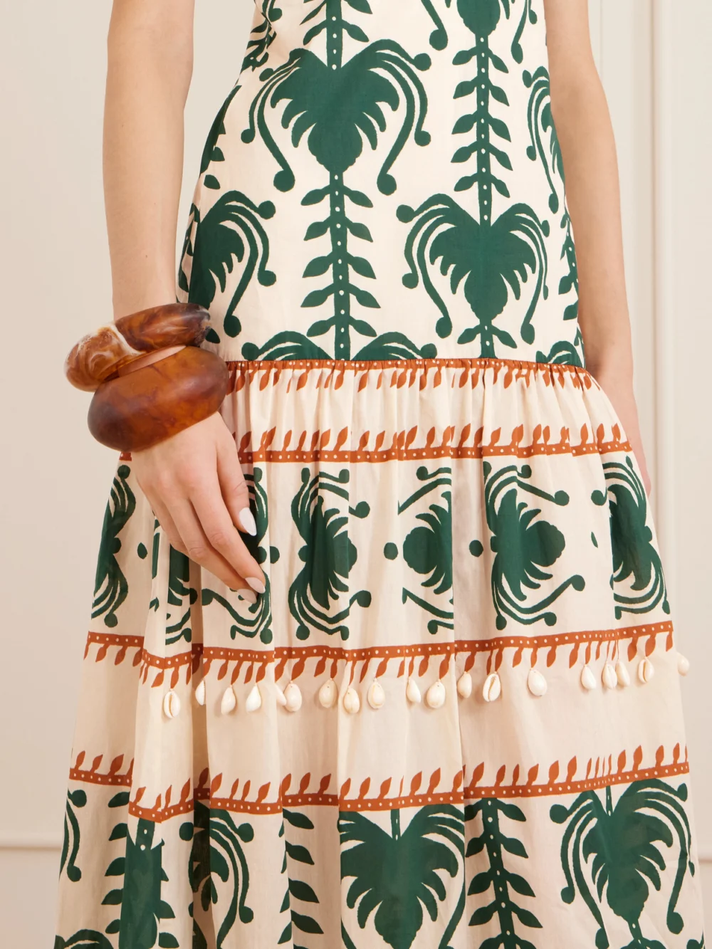 Close-up detail of the Johanna Ortiz Keeper Shell-embellished Printed Cotton-poplin Maxi Dress