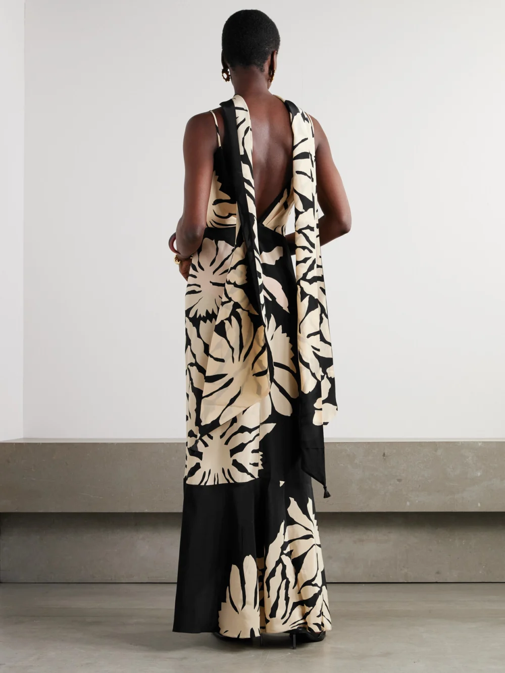 Back view of the Johanna Ortiz Santa Cruz Wrap-effect Gathered Floral-print Silk Maxi Dress