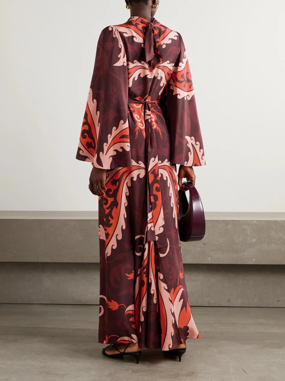 Back view of the Johanna Ortiz Santa Maria Belted Printed Silk-satin Maxi Dress