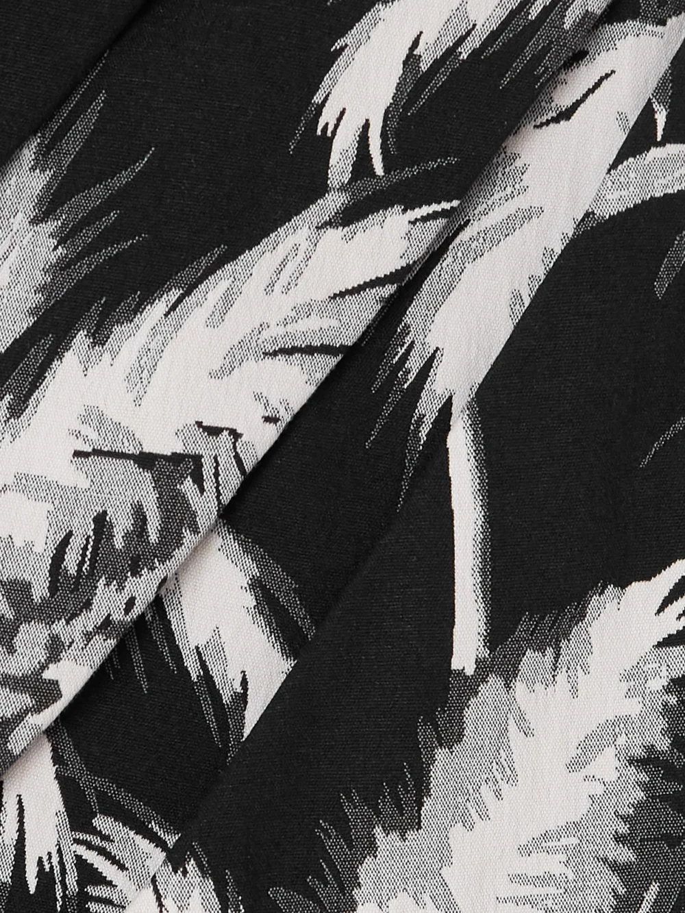Close-up detail of the Johanna Ortiz Sombra Tropical Strapless Embellished Printed Cotton-blend Mini Dress