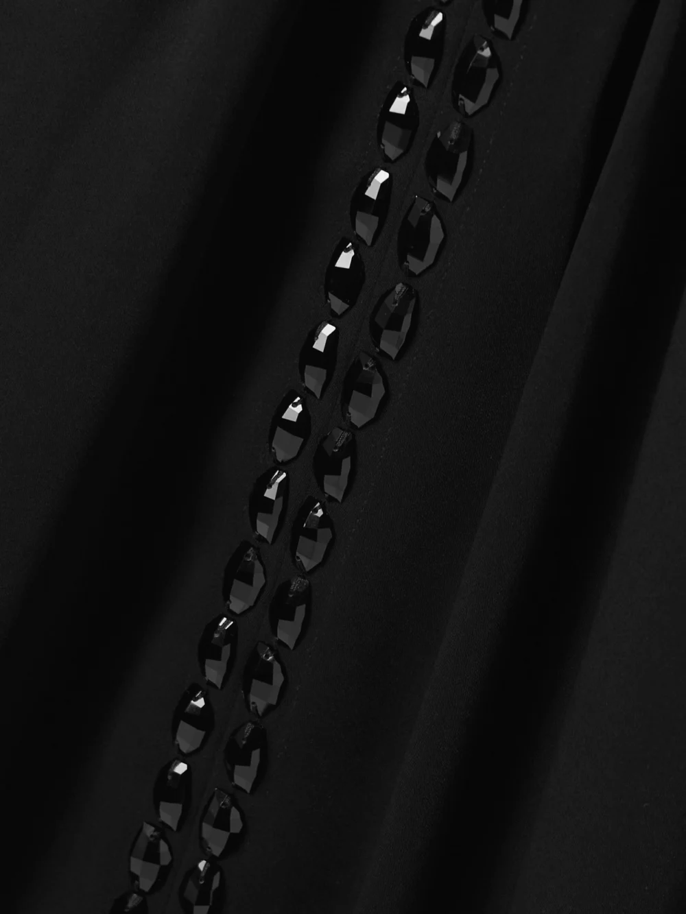 Close-up detail of the Johanna Ortiz Sombreando Crystal-embellished Pleated Crepe Maxi Dress