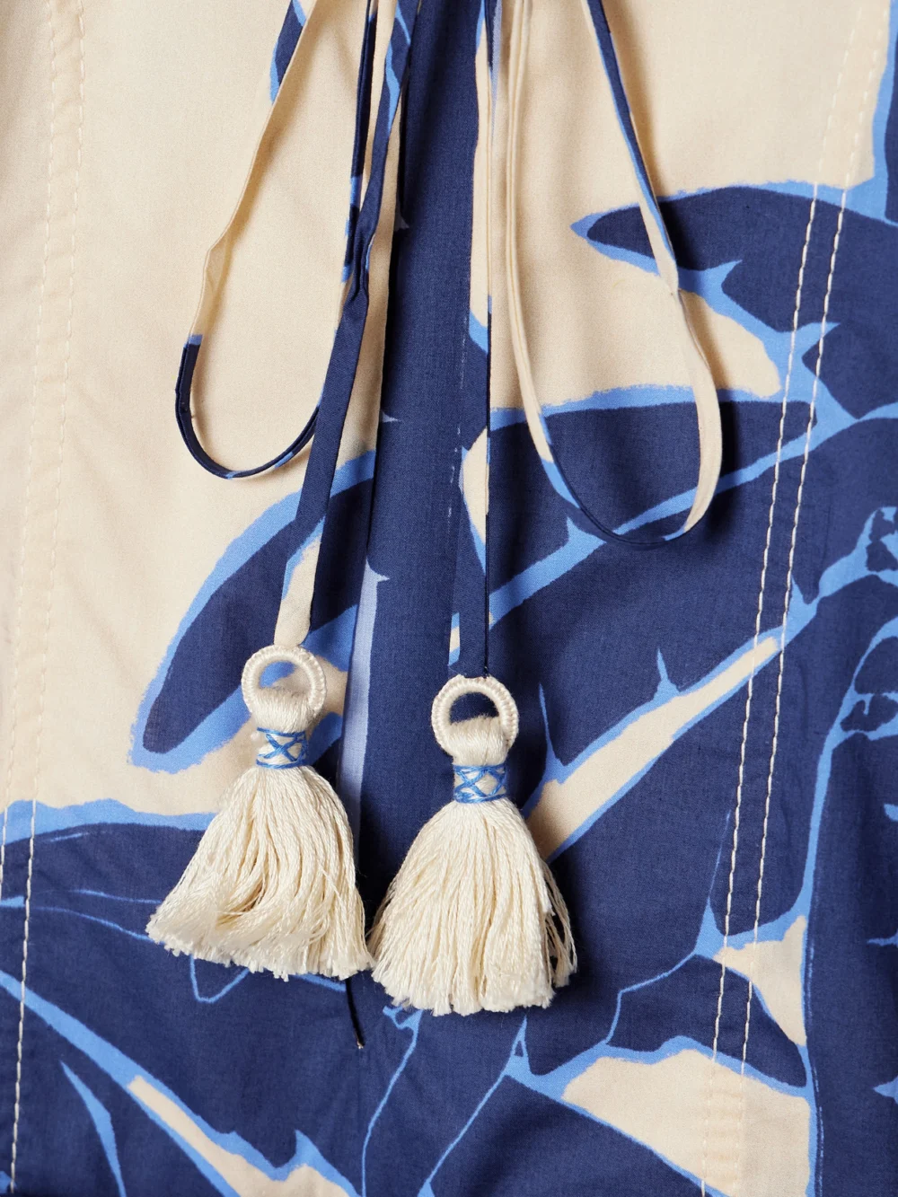 Close-up detail of the Johanna Ortiz Sotaviento Belted Printed Cotton-voile Midi Dress