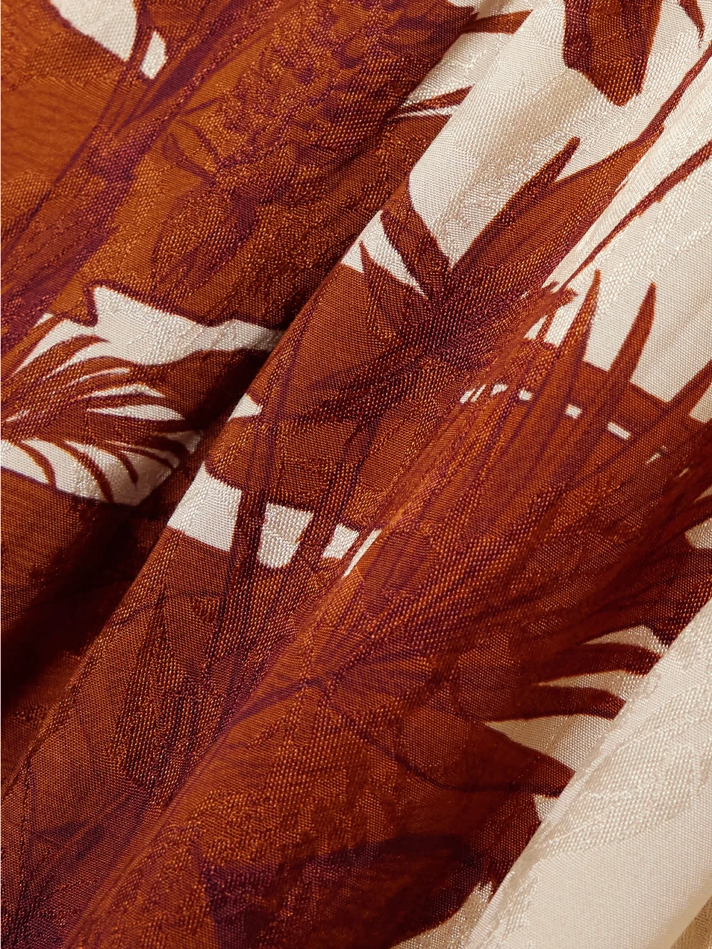 Close-up detail of the Johanna Ortiz Unmooring Tie-detailed Printed Satin-jacquard Midi Wrap Dress