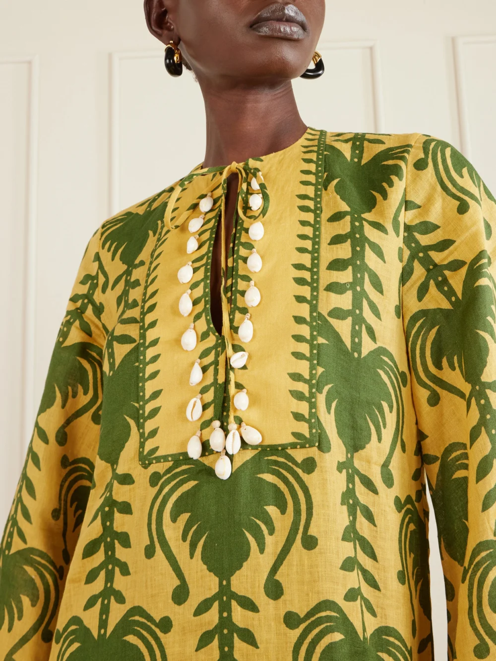 Close-up detail of the Johanna Ortiz Wild Savannah Shell-embellished Linen Mini Dress