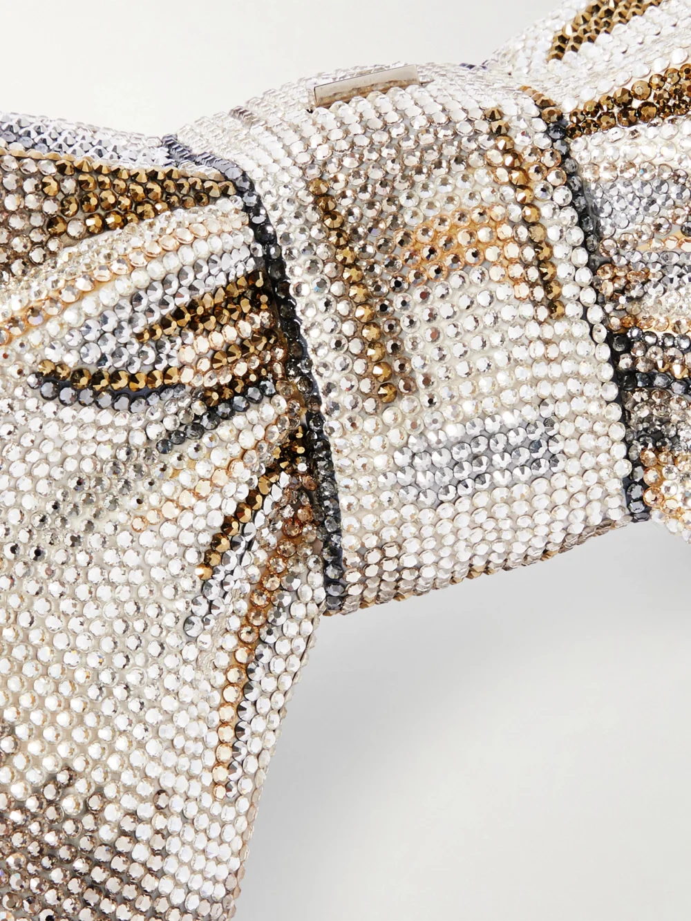 Close-up detail of the Judith Leiber Couture Bow Just for You Crystal-embellished Silver-tone Clutch
