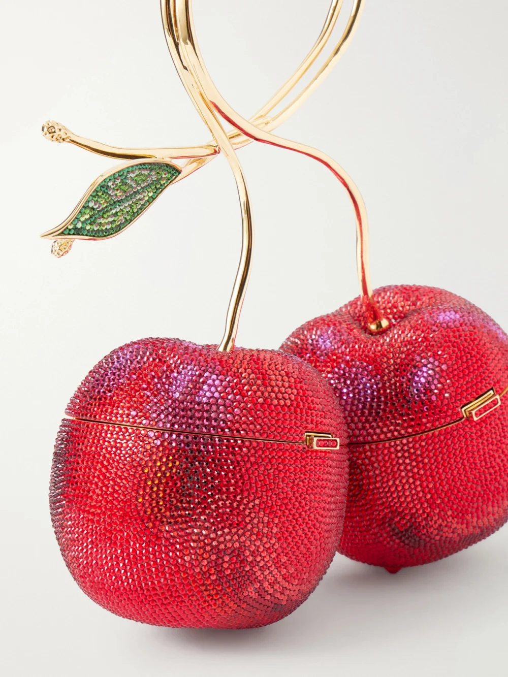 Close-up detail of the Judith Leiber Couture Cherries Crystal-embellished Gold-tone Clutch