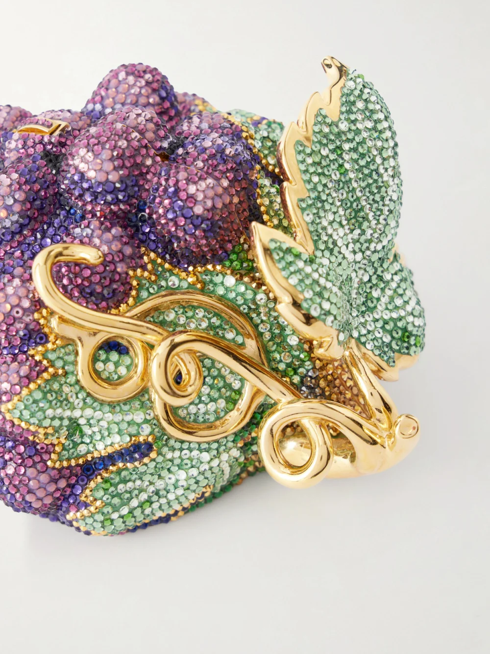 Close-up detail of the Judith Leiber Couture Grapes Crystal-embellished Gold-tone Clutch