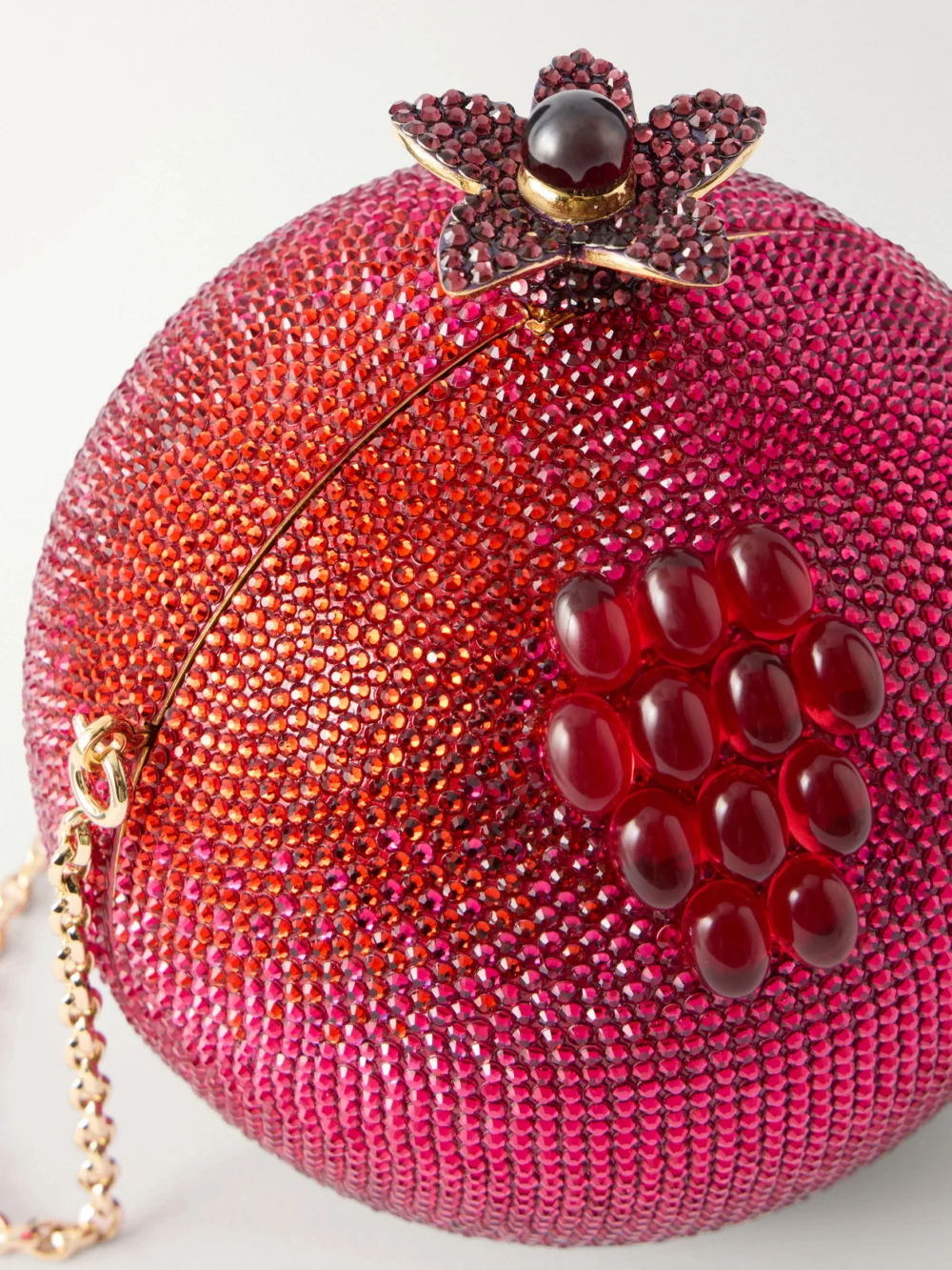 Close-up detail of the Judith Leiber Couture Pomegranate Crystal-embellished Gold-tone Clutch