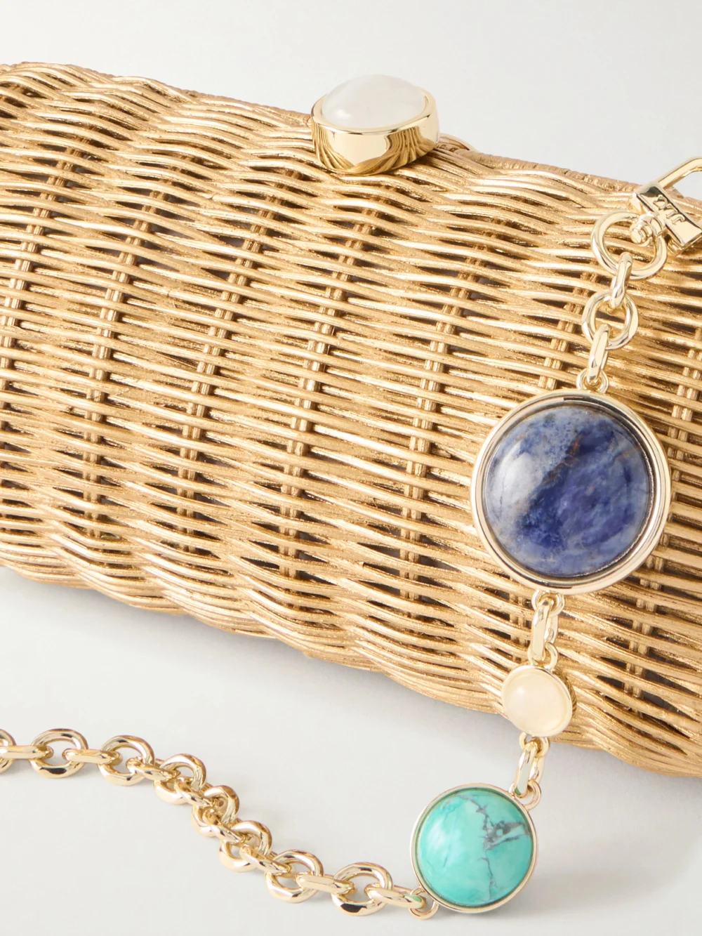 Close-up detail of the Judith Leiber Couture Poppy Basket Rattan Clutch