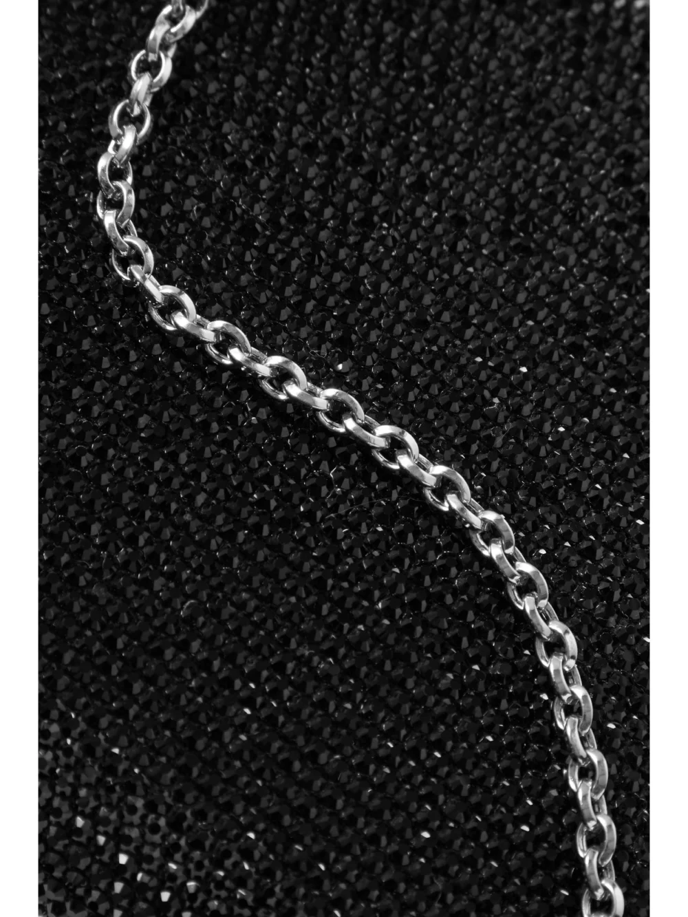 Close-up detail of the Judith Leiber Couture Slim Slide Crystal-embellished Silver-tone Clutch
