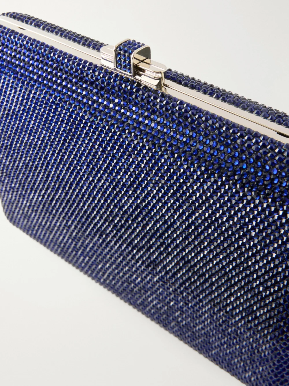 Close-up detail of the Judith Leiber Couture Slim Slide Crystal-embellished Silver-tone Clutch