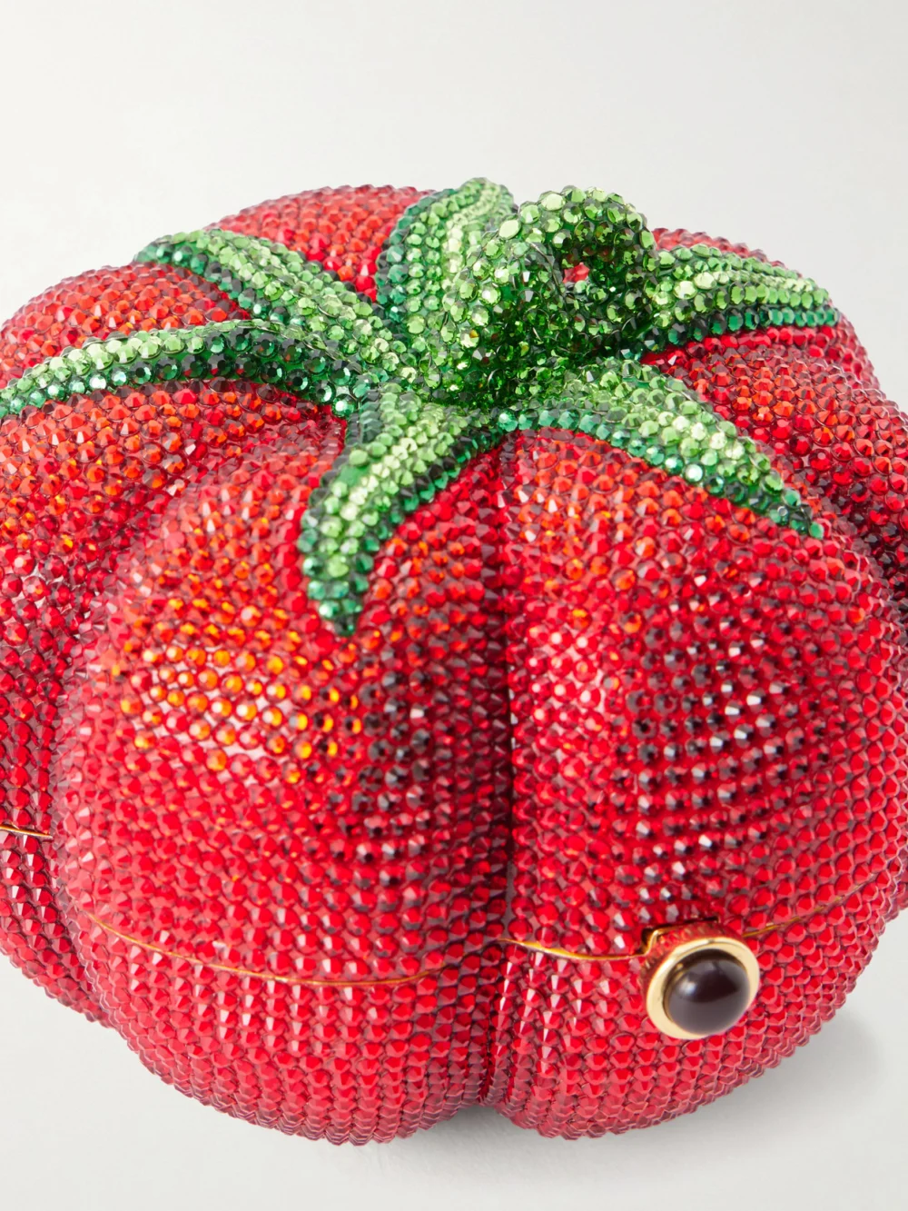 Close-up detail of the Judith Leiber Couture Tomato Crystal-embellished Gold-tone Clutch