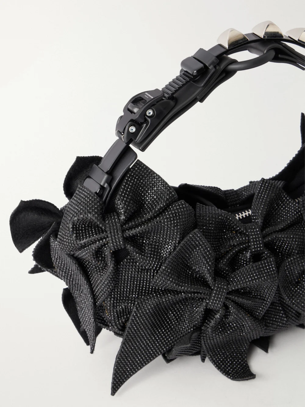 Close-up detail of the Junya Watanabe + Innerraum Bow-detailed Embellished Polyurethane and Canvas Shoulder Bag