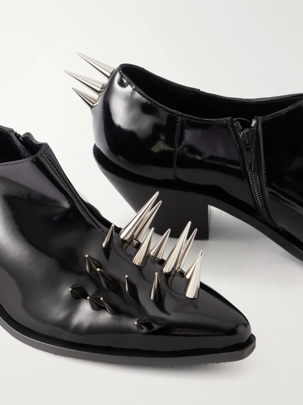 Close-up detail of the Junya Watanabe Studded Patent-leather Ankle Boots