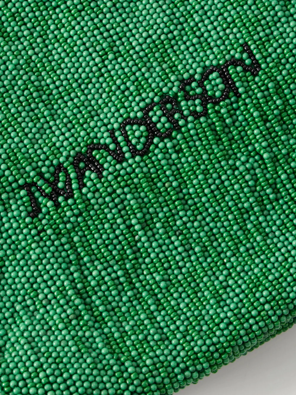 Close-up detail of the JW Anderson Bead-embellished Leather-trimmed Canvas Tote