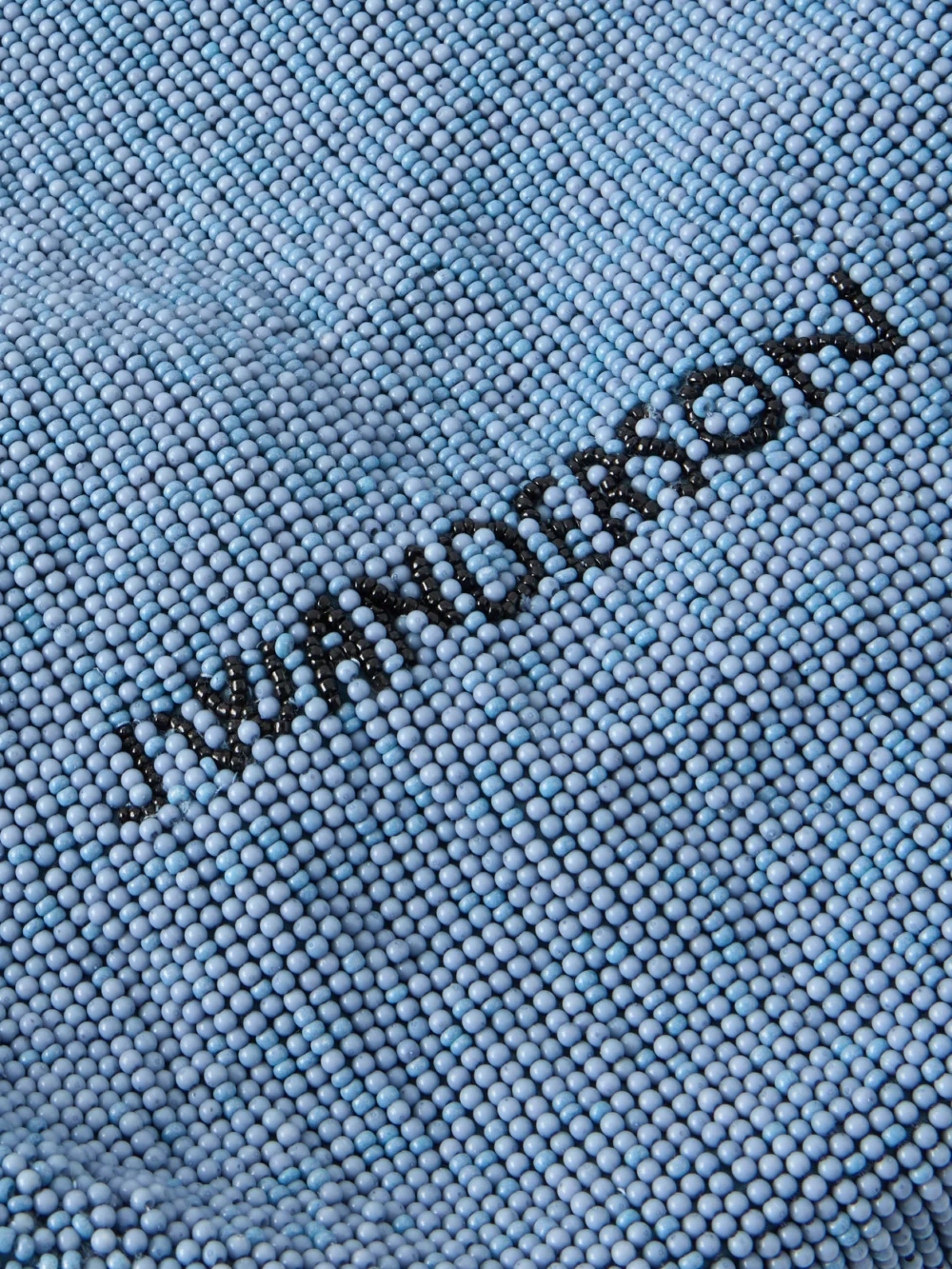 Close-up detail of the JW Anderson Bead-embellished Leather-trimmed Canvas Tote